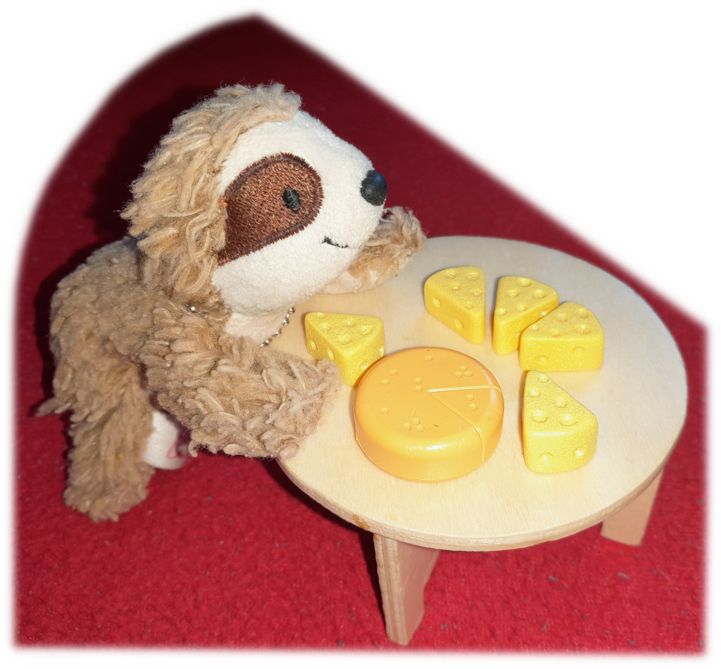 Eliza am Tisch mit Käse